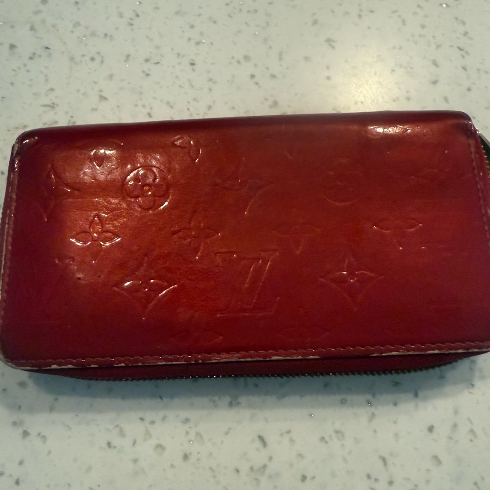 Louis vuitton empriente leather zipped wallet